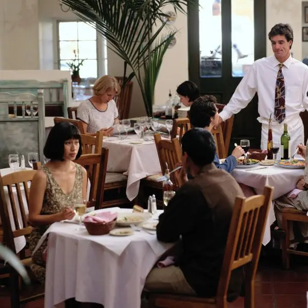 people having dinner in a restaurant