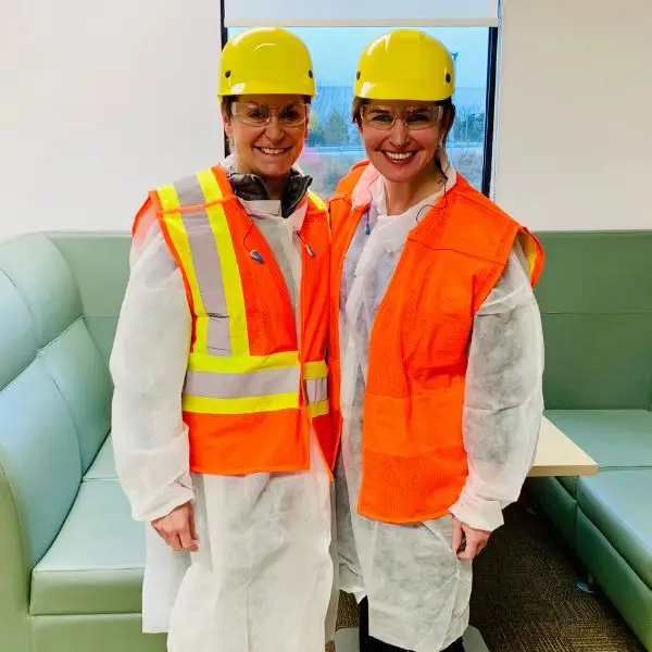 janice and heather in protective gear and hardhats